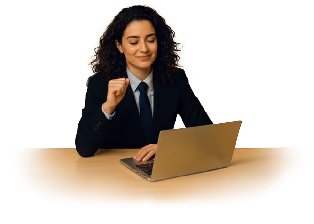A woman smiling while working on a laptop smile happily