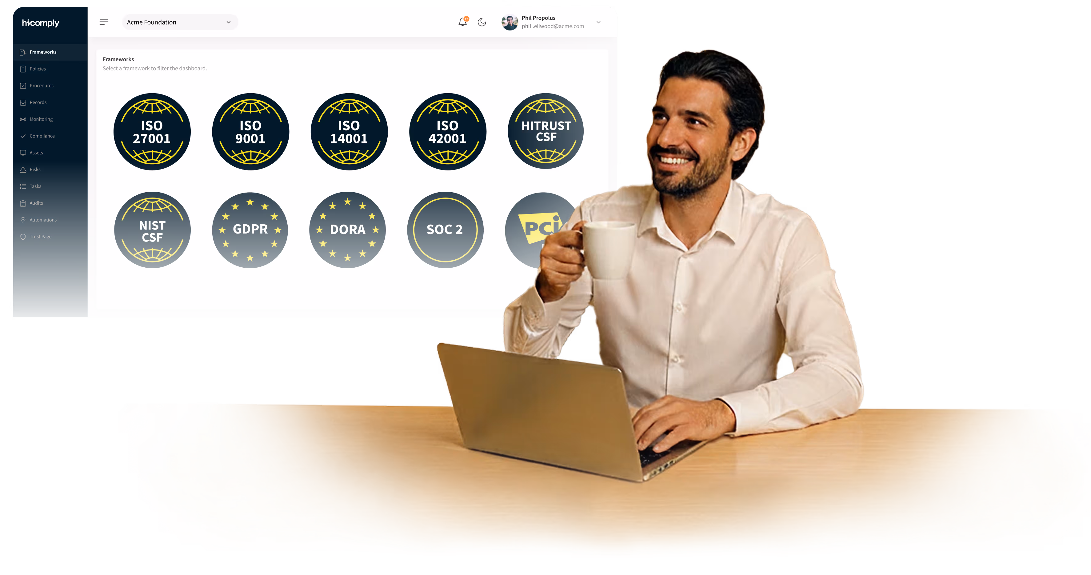 A man holding a coffee cup and looking at a laptop screen that shows various compliance standards like ISO and GDPR