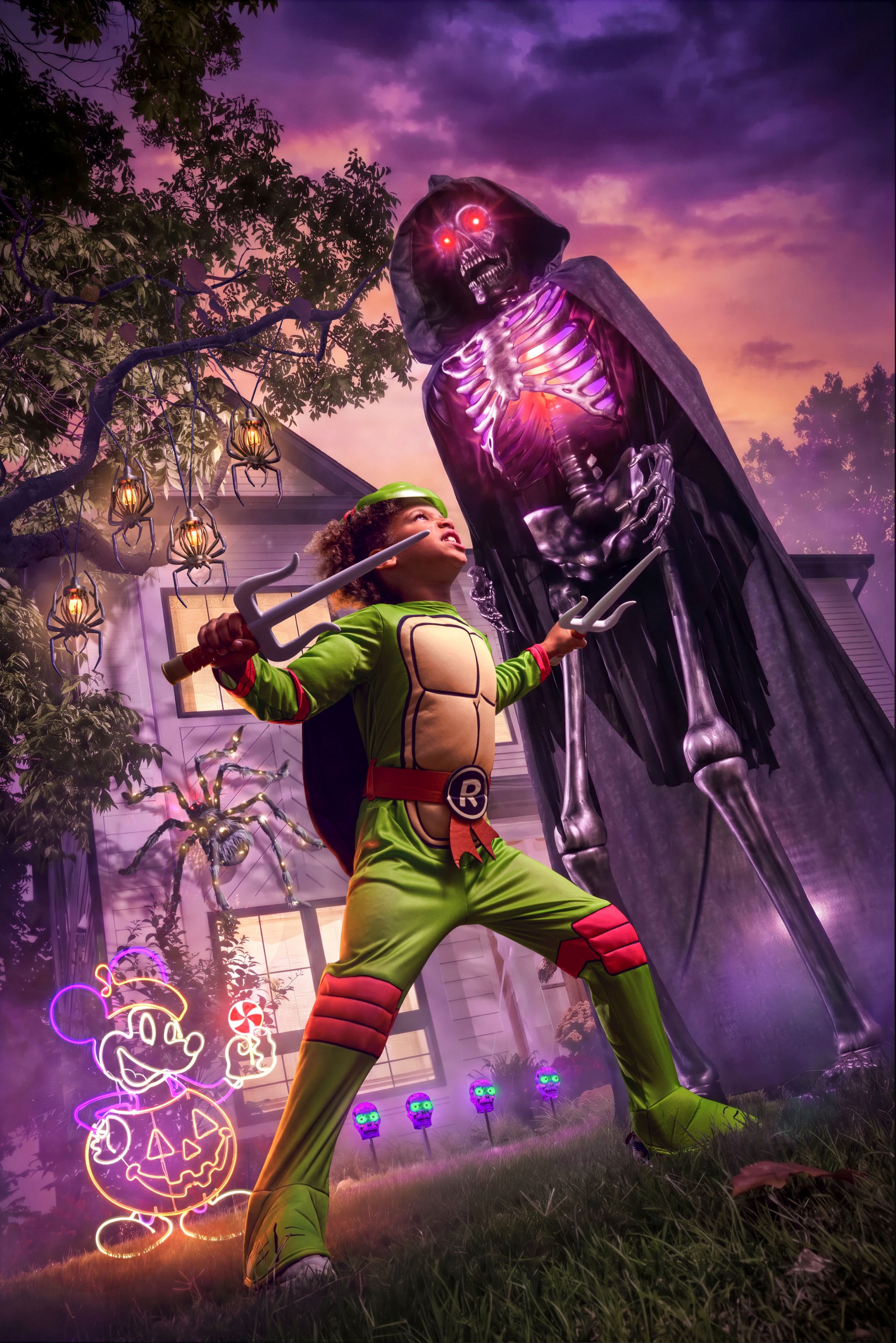 Final colour scene of a kid in a Ninja Turtle costume beside a glowing giant skeleton decoration