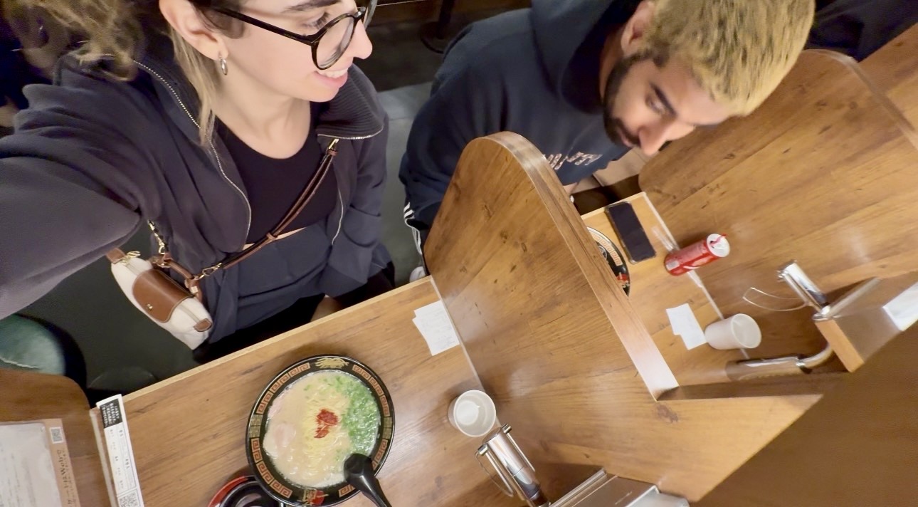 Nas and Alba from nalba travels enjoying ramen at an Ichiran restaurant in tokyo