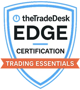 The Trade Desk EDGE Certification Trading Essentials badge in a shield shape with blue and orange accents.