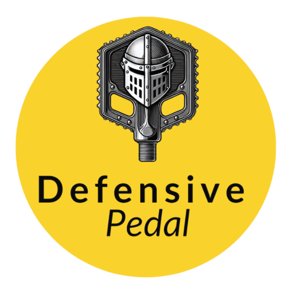 Logo for Defensive pedal, an armoured helmet within a pedal illustration