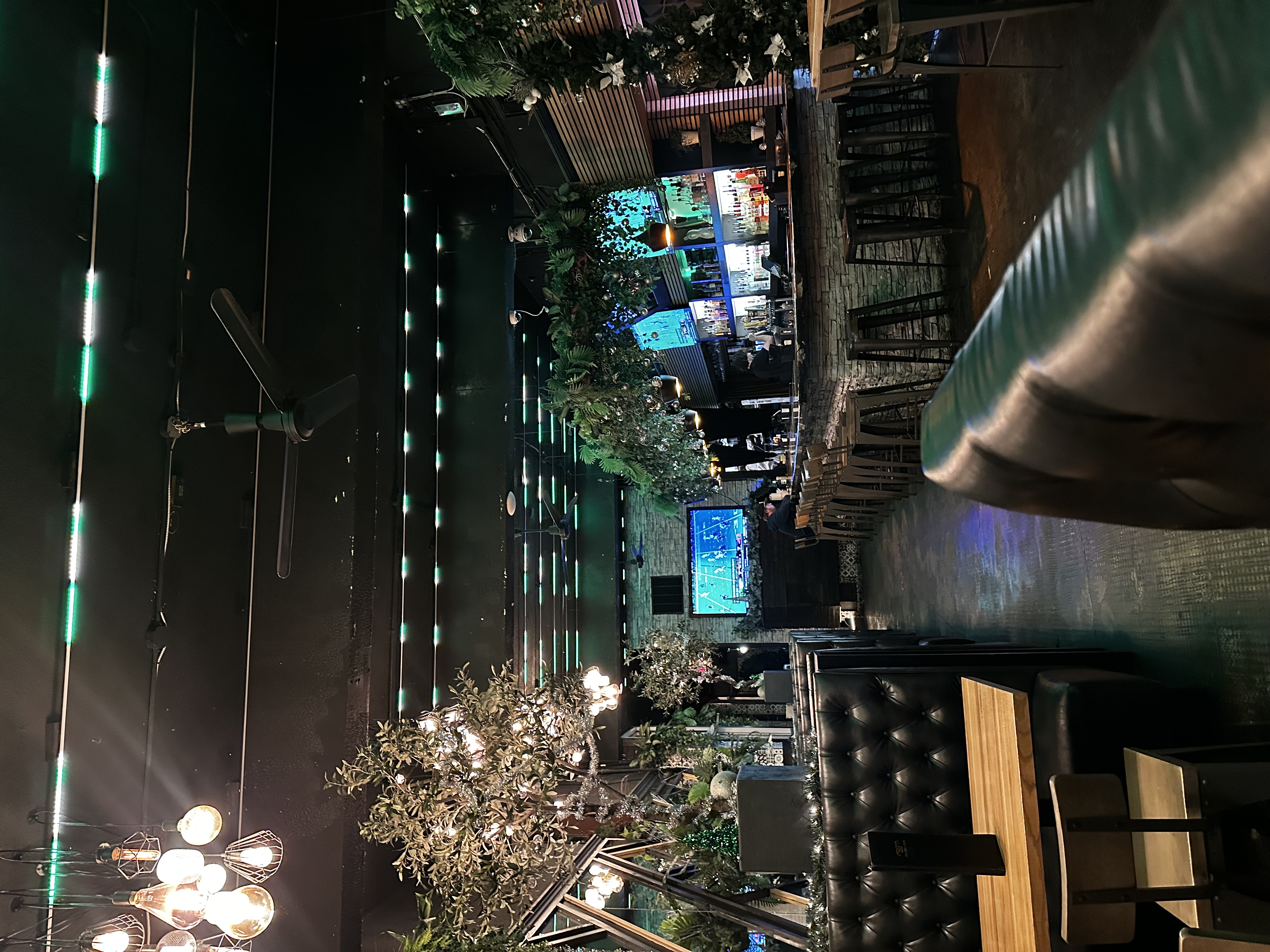 platter of crispy chips served with fresh carrot sticks, broccoli florets, celery, and a side of creamy ranch dip with a sprinkle of cheese on the chip