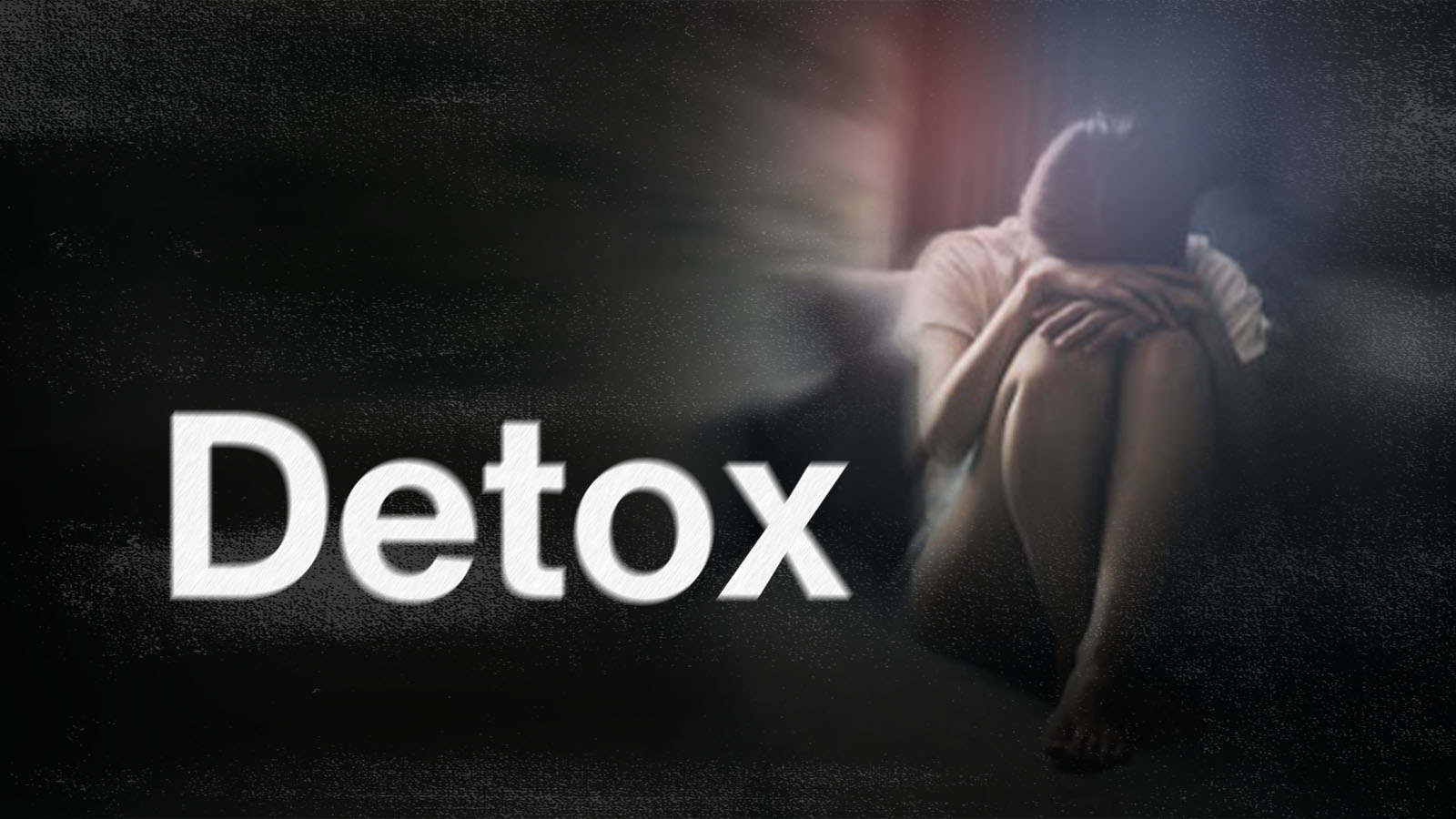 Person sitting with knees hugged and head down next to large text reading 'Detox' on a dark background.