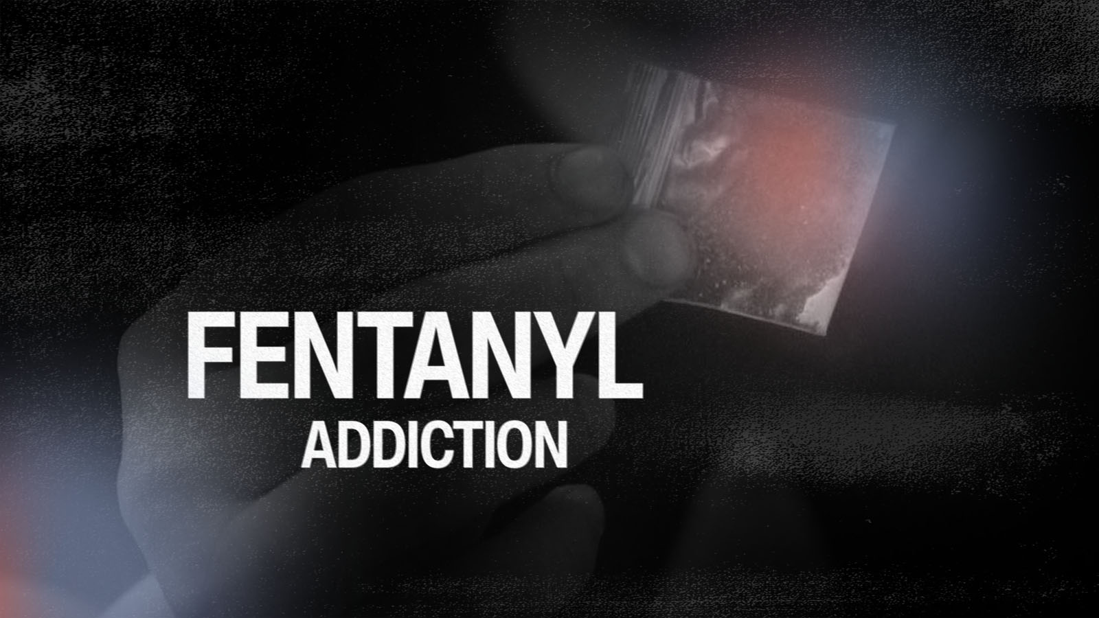 Hand holding a small plastic bag containing white powder with the text 'FENTANYL ADDICTION'.
