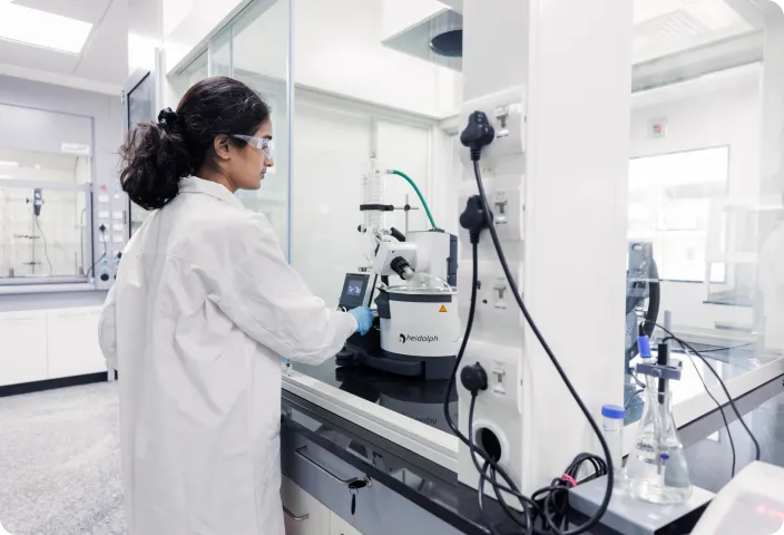 A scientist working with lab equipment, showcasing Honour’s tailored chemical synthesis capabilities