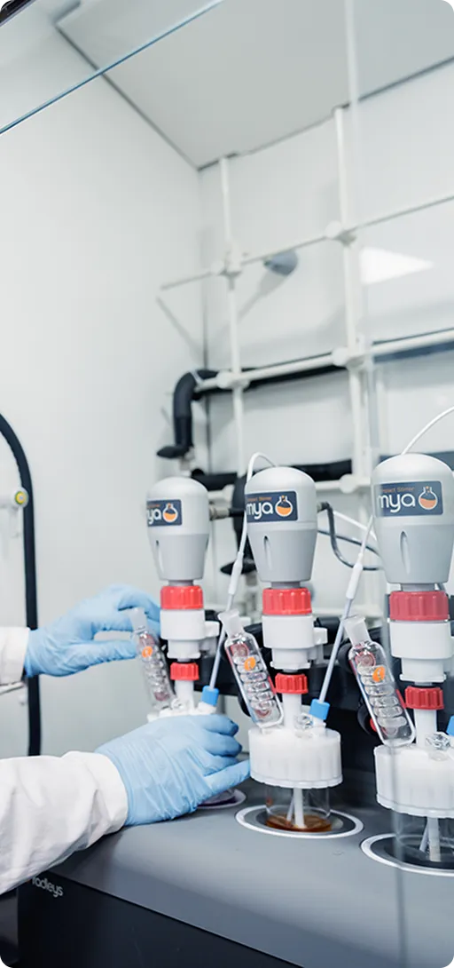 Scientist in a lab conducting precision chemical synthesis using specialized equipment, representing Honour’s expertise in custom synthesis
