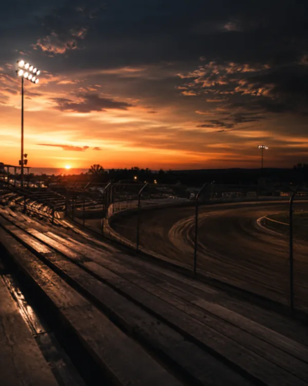 Sprint cars racing at night