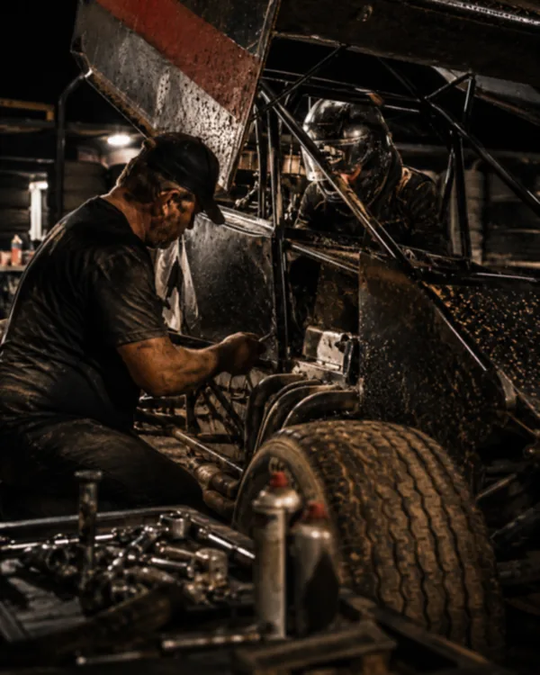 Working on the car in the garage