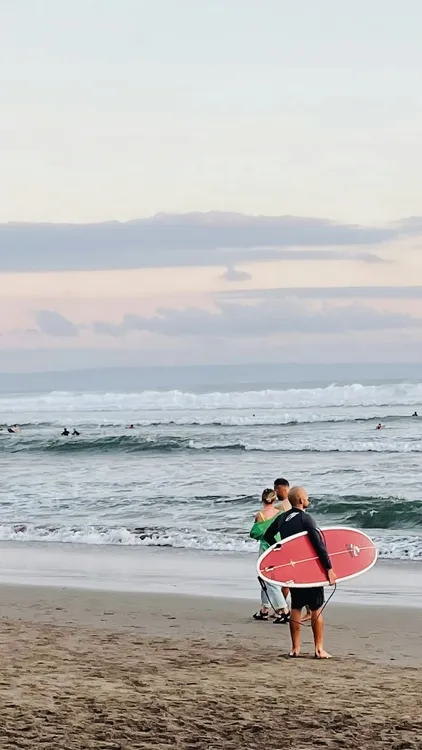 surfer at canggu beach