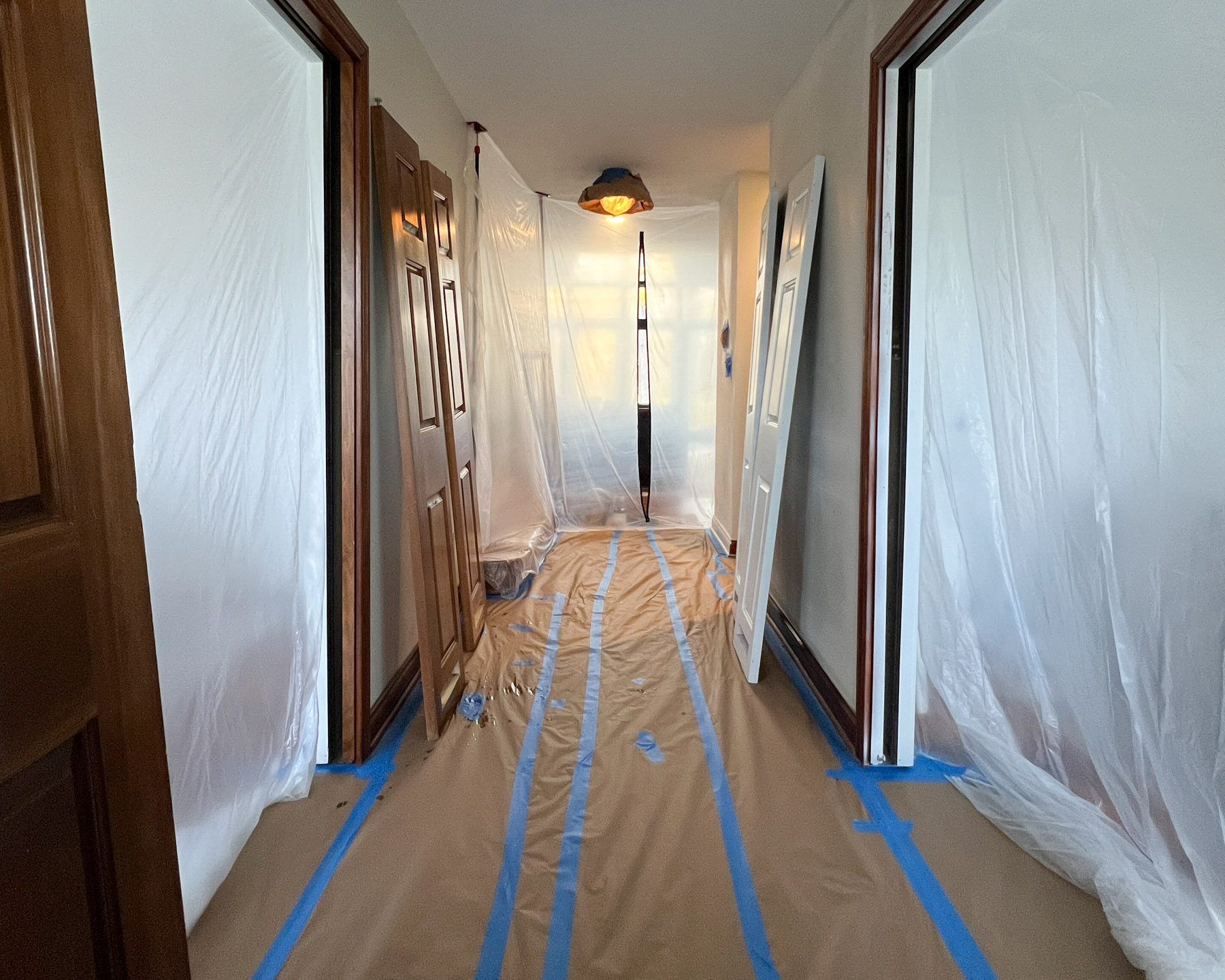 Man installing office doors.