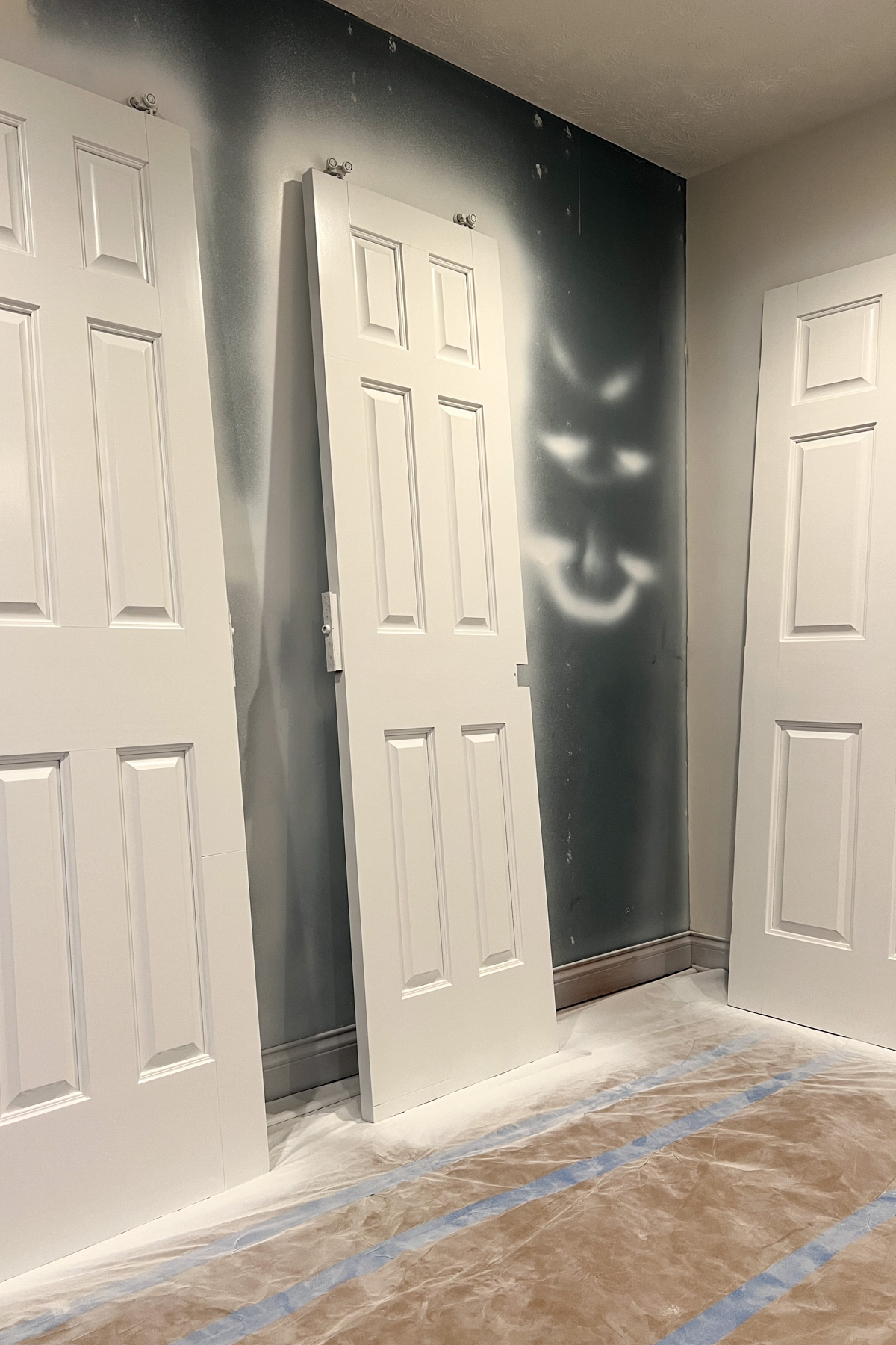 One month into our office renovation, we've reached a milestone: all doors are sprayed! Refinishing them was a marathon, not a sprint.