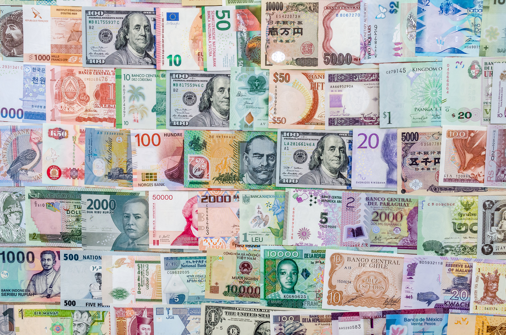 Top view of a collection of world banknotes