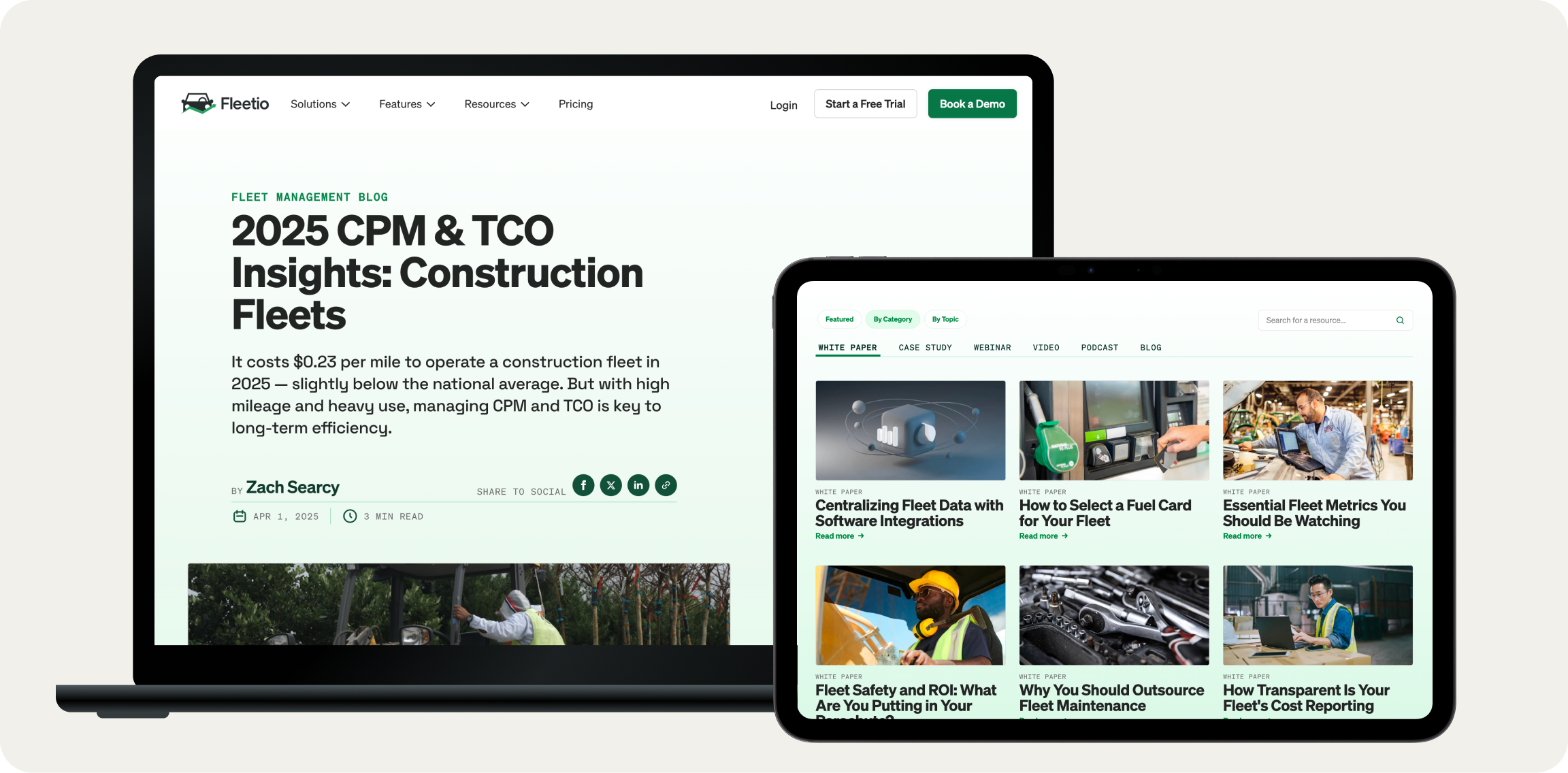 Laptop and tablet displaying Fleetio fleet management blog and resources with articles on construction fleets and fleet data integration.
