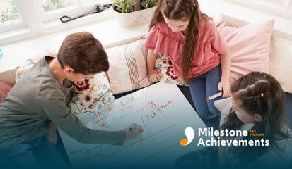 Three autistic children working together on a chore chart, using colorful markers to track their tasks.