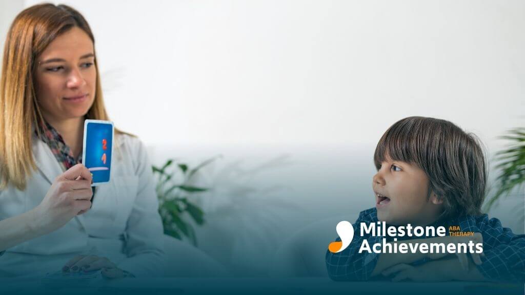 Therapist shows number flashcard to child during structured learning activity, supporting communication and attention skills