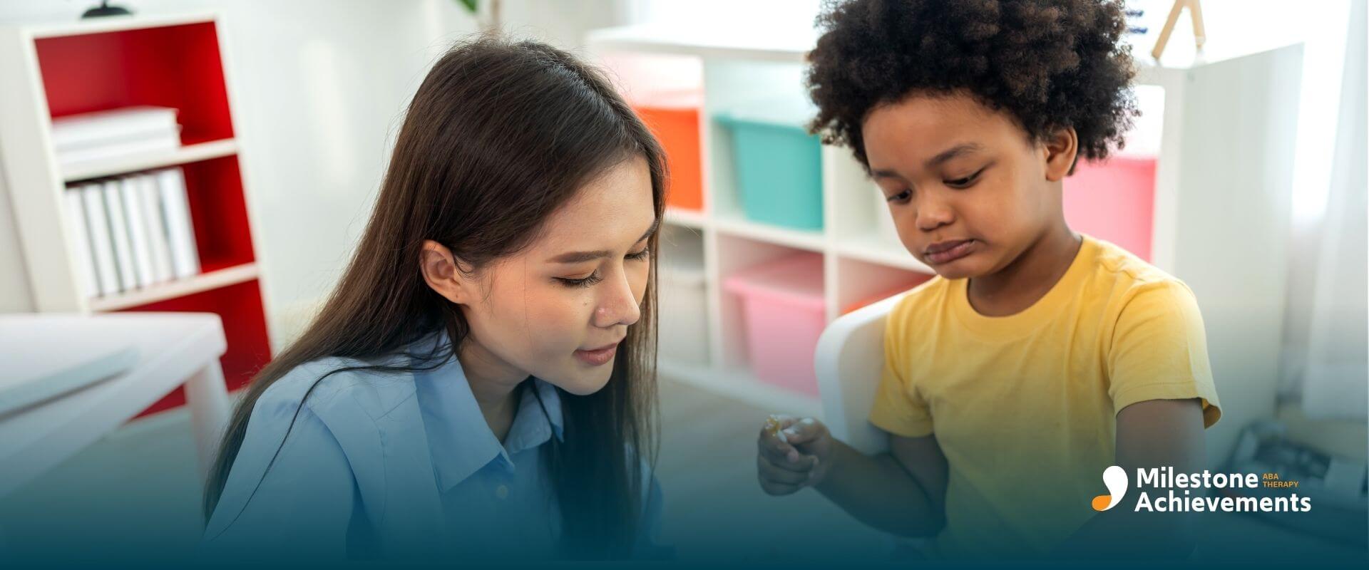 Therapist helping a n autistic child learn numbers using a colorful learning wheel during an educational therapy session.