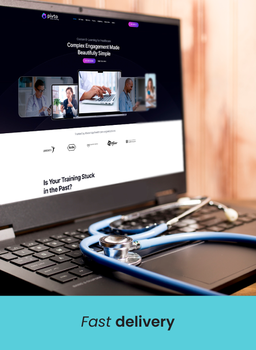 Laptop displaying a website with a clipboard on the desk.