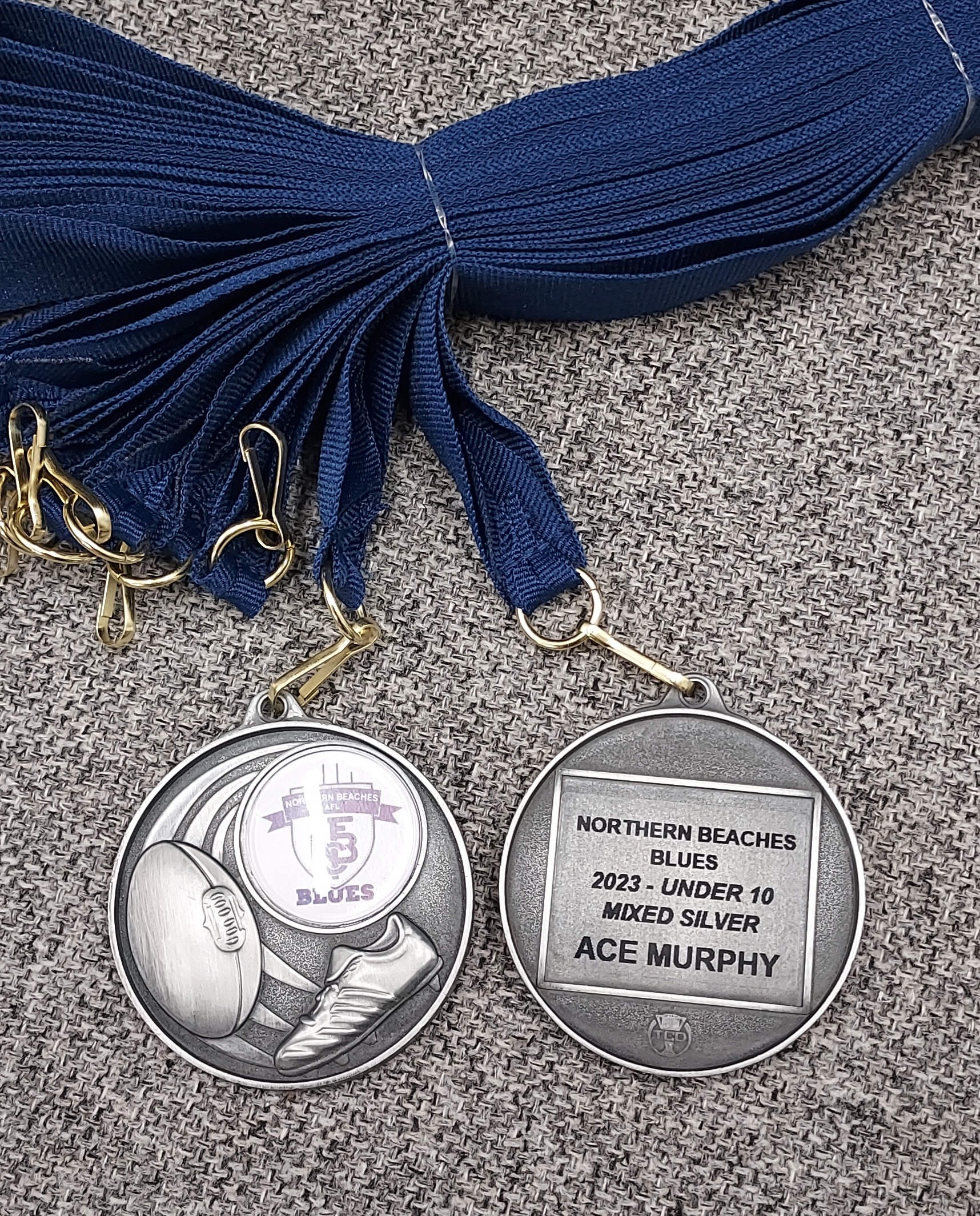 Football medals from Greg's Trophies Coffs Harbour