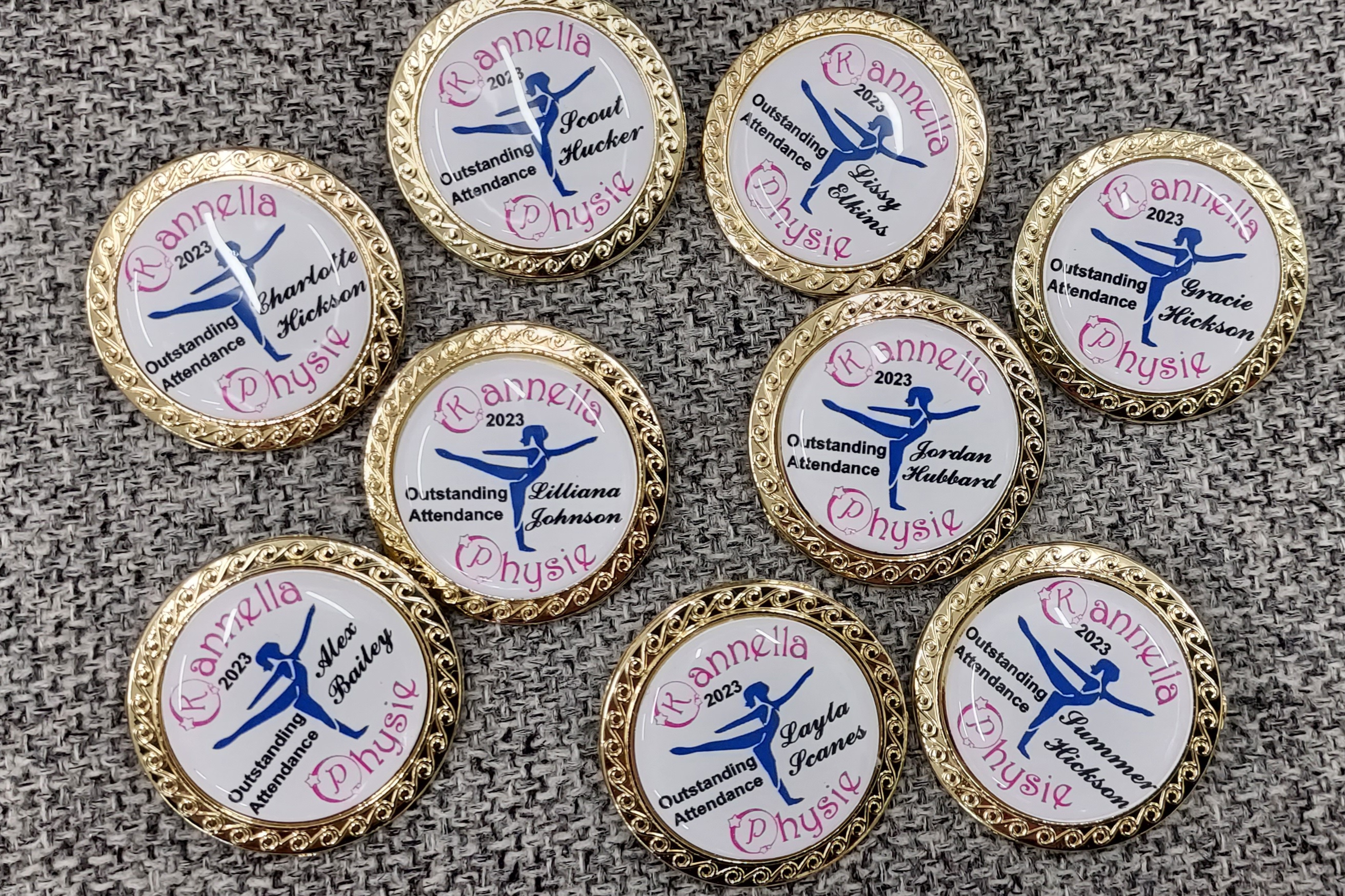 Round name badges from Greg's Trophies Coffs Harbour