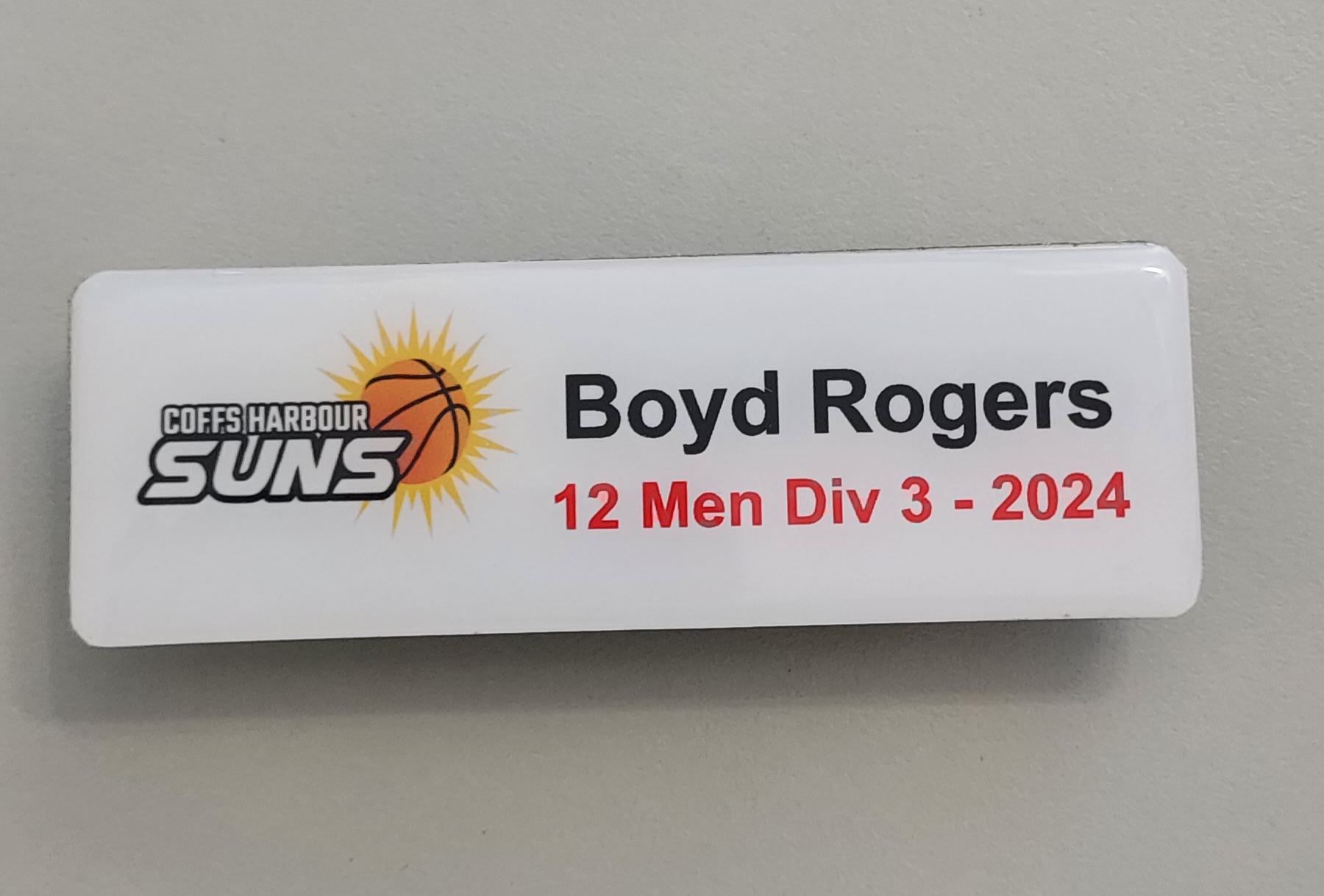 Sporting team name badges from Greg's Trophies Coffs Harbour