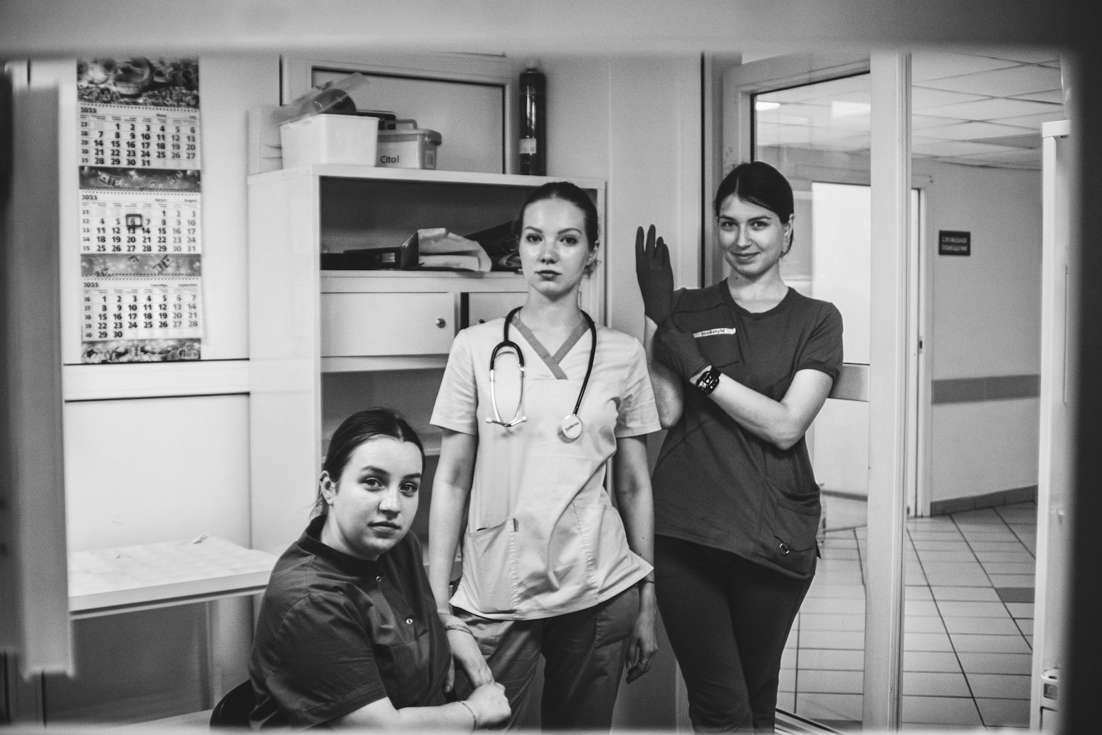 A medical team in a clinic hallway