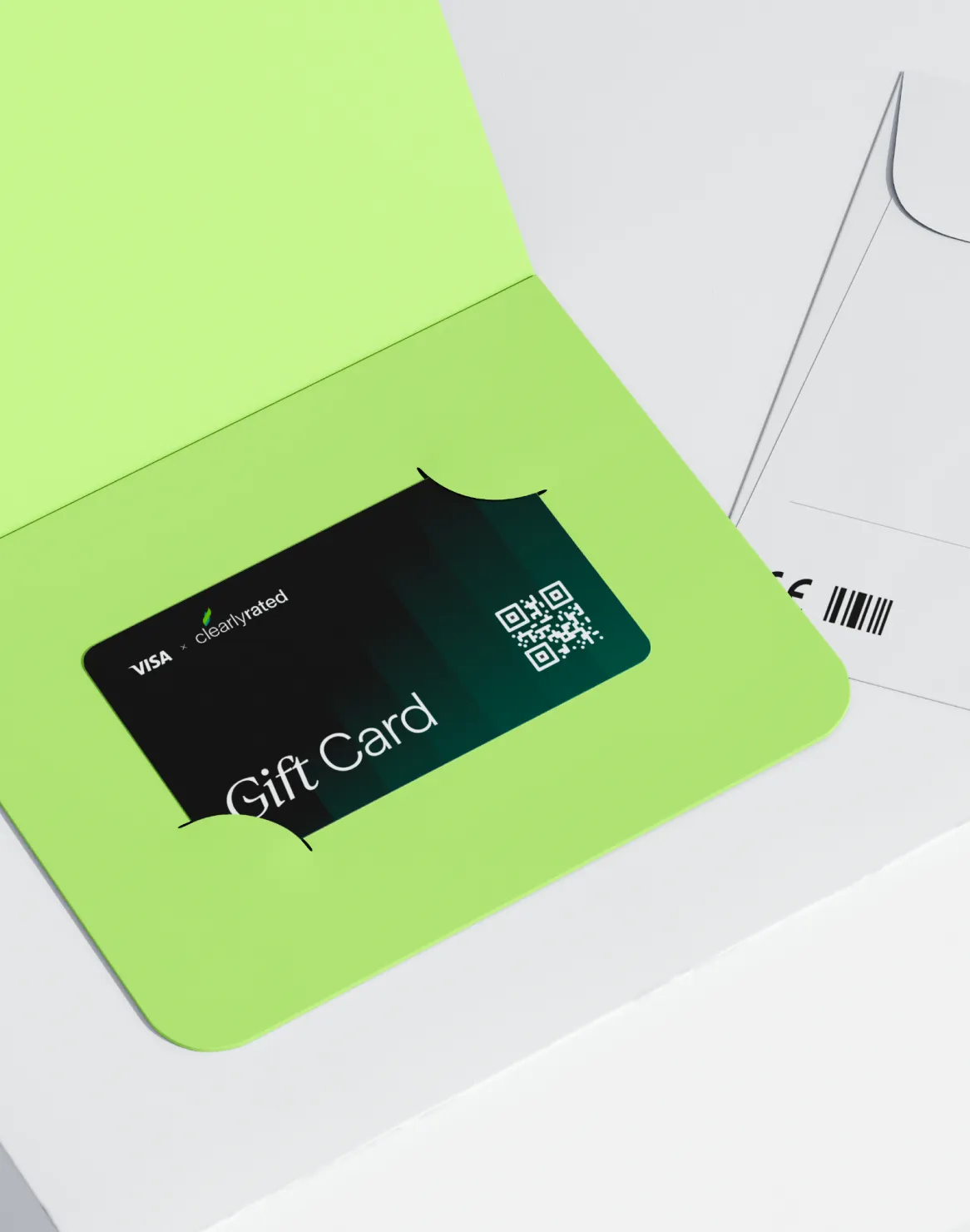 A sleek black gift card with a QR code, branded “Visa + ClearlyRated,” partially tucked into a bright green envelope on a clean, minimal surface.
