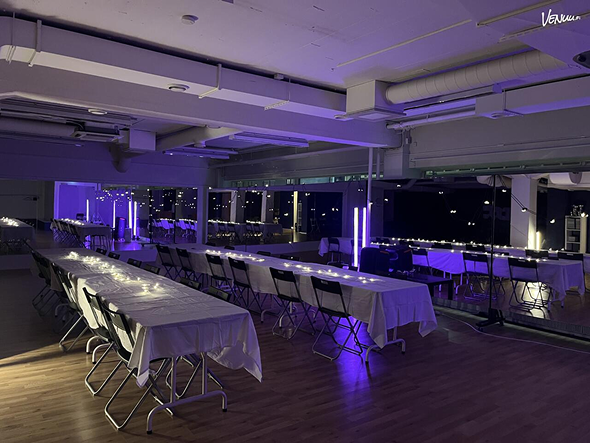 Picture of dance studio with blue lights.