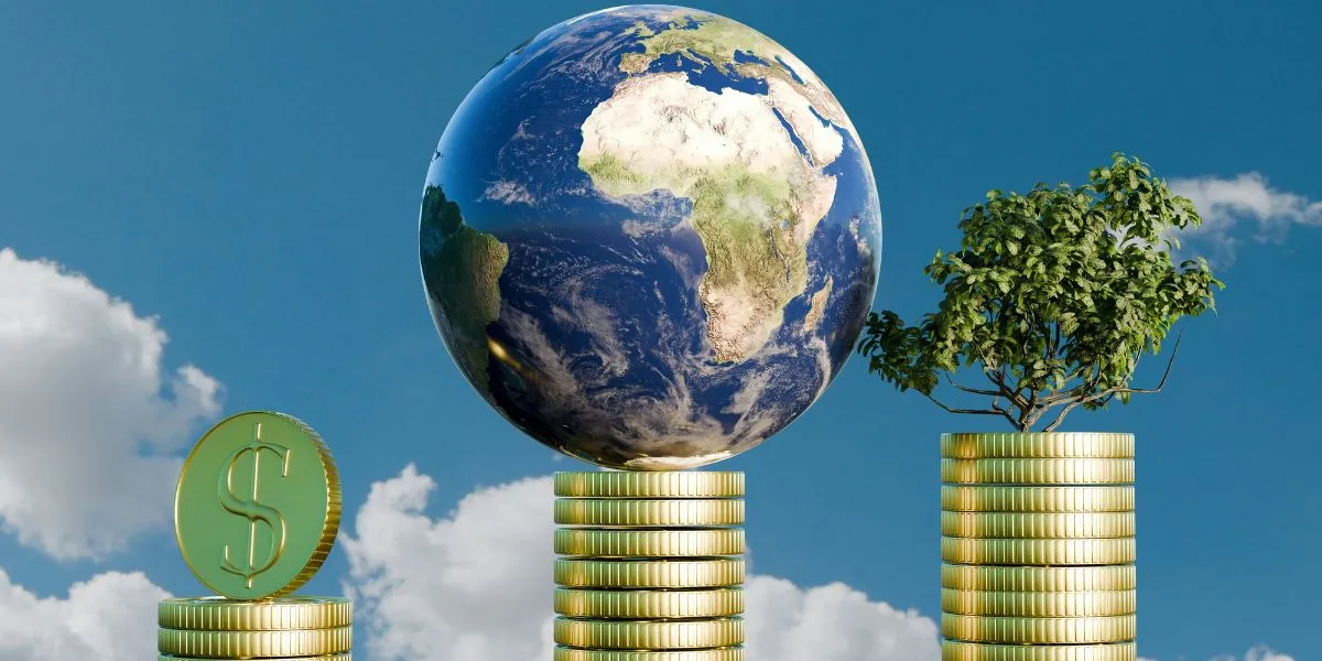 Stacked gold coins with a dollar sign, Earth globe, and tree symbolizing finance, sustainability, and environmental growth.