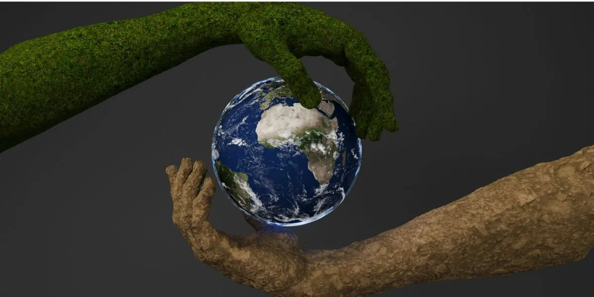 Two textured hands—one mossy green, one brown—holding a detailed Earth globe against a dark background.
