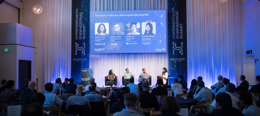 Panel discussion on stage at the Hypergrowth Engineering Summit