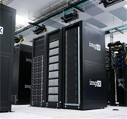 Server racks with imgIX branding in a modern data center room with overhead cable trays.