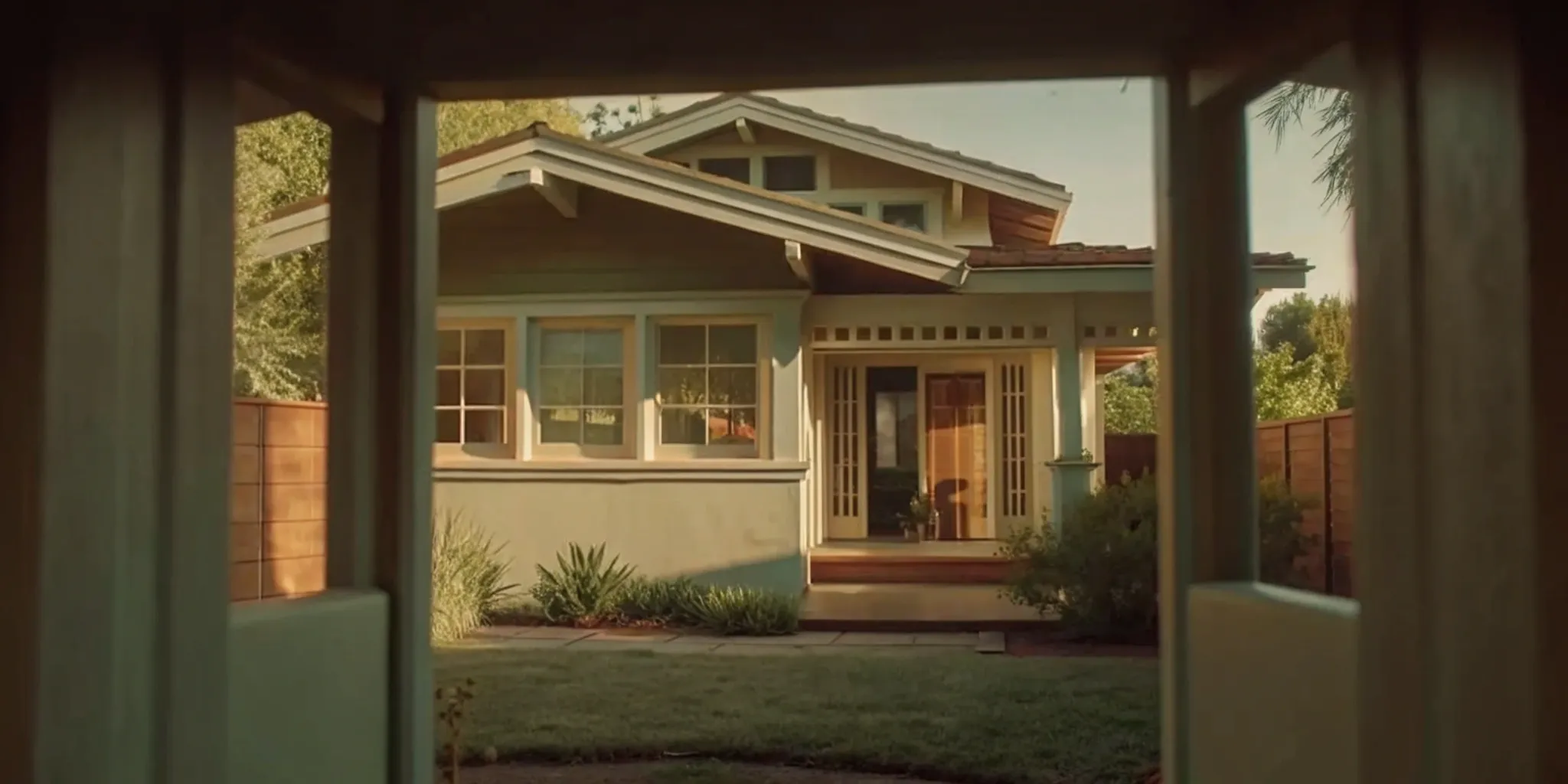 A residential house with a yard, a property where ADU zoning rules apply.