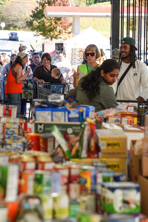 Volunteers assist shoppers at the Ingles Garden Center Distribution point.