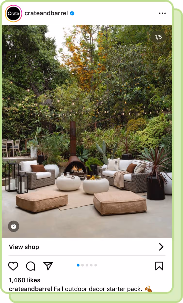 crate and barrel outdoor furniture and floor cushions in front of lush green background ig screenshot