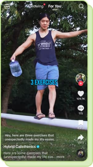 man balancing on beam holding water jug