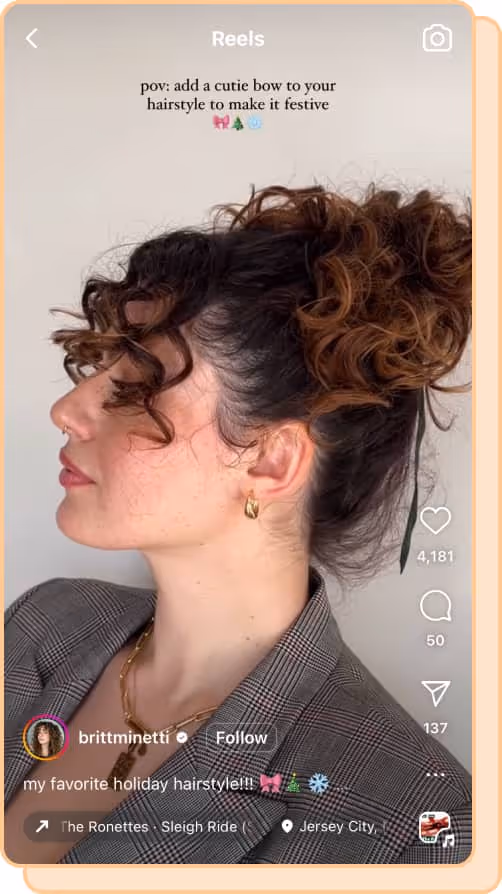 woman wears plaid blazer with brunette curly updo