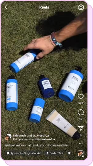 bottles of baxter of california lying on the grass 