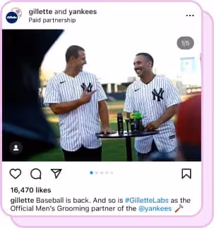 two men wear new york yankees jerseys on ball field