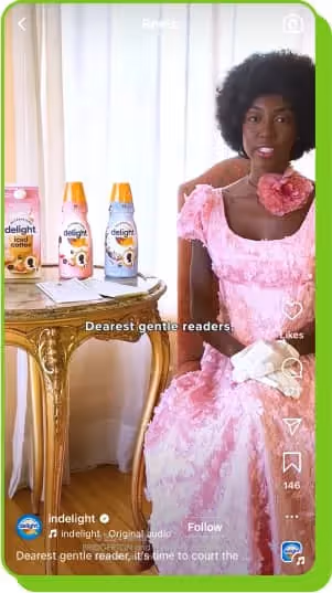 creator in pink dress promoting International Delight Bridgerton collab with creative storytelling