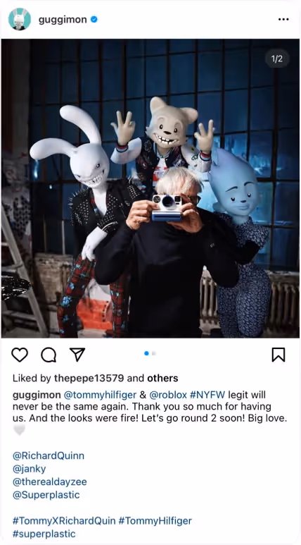 Guggimon and Tommy Hilfiger taking a polaroid