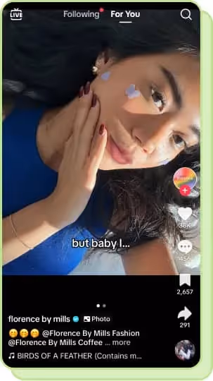 tiktok screenshot of girl posing with pimple stickers on her face