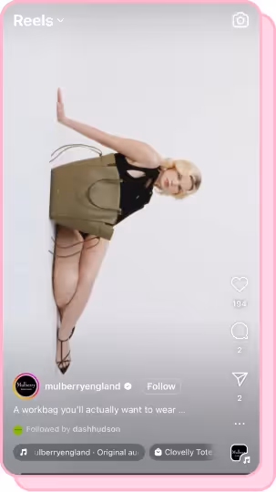 model posing with olive mulberry handbag