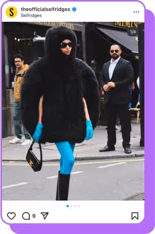 woman wearing blue tights and fuzzy black jacket