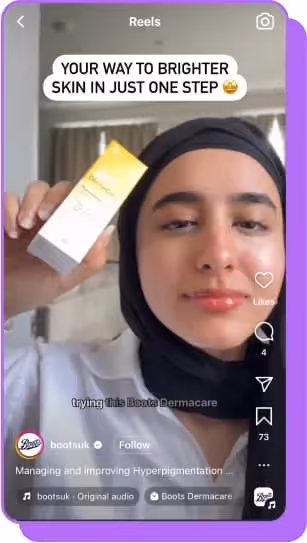 woman holding up supergood sunscreen