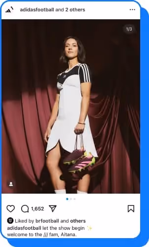 athlete wearing adidas dress holding adidas shoes 