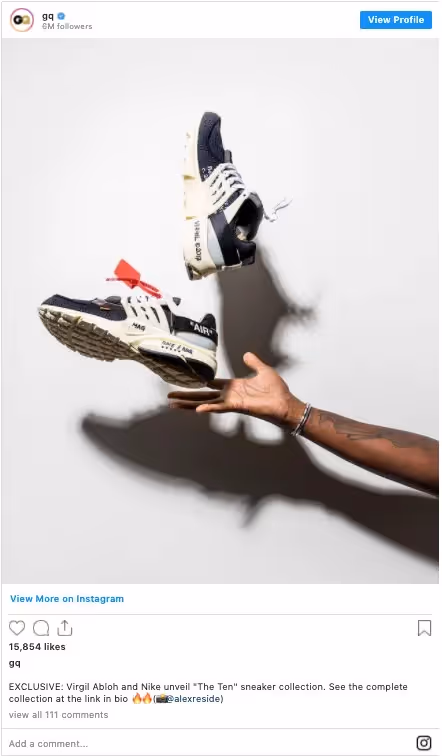 hand throwing running shoes into the air