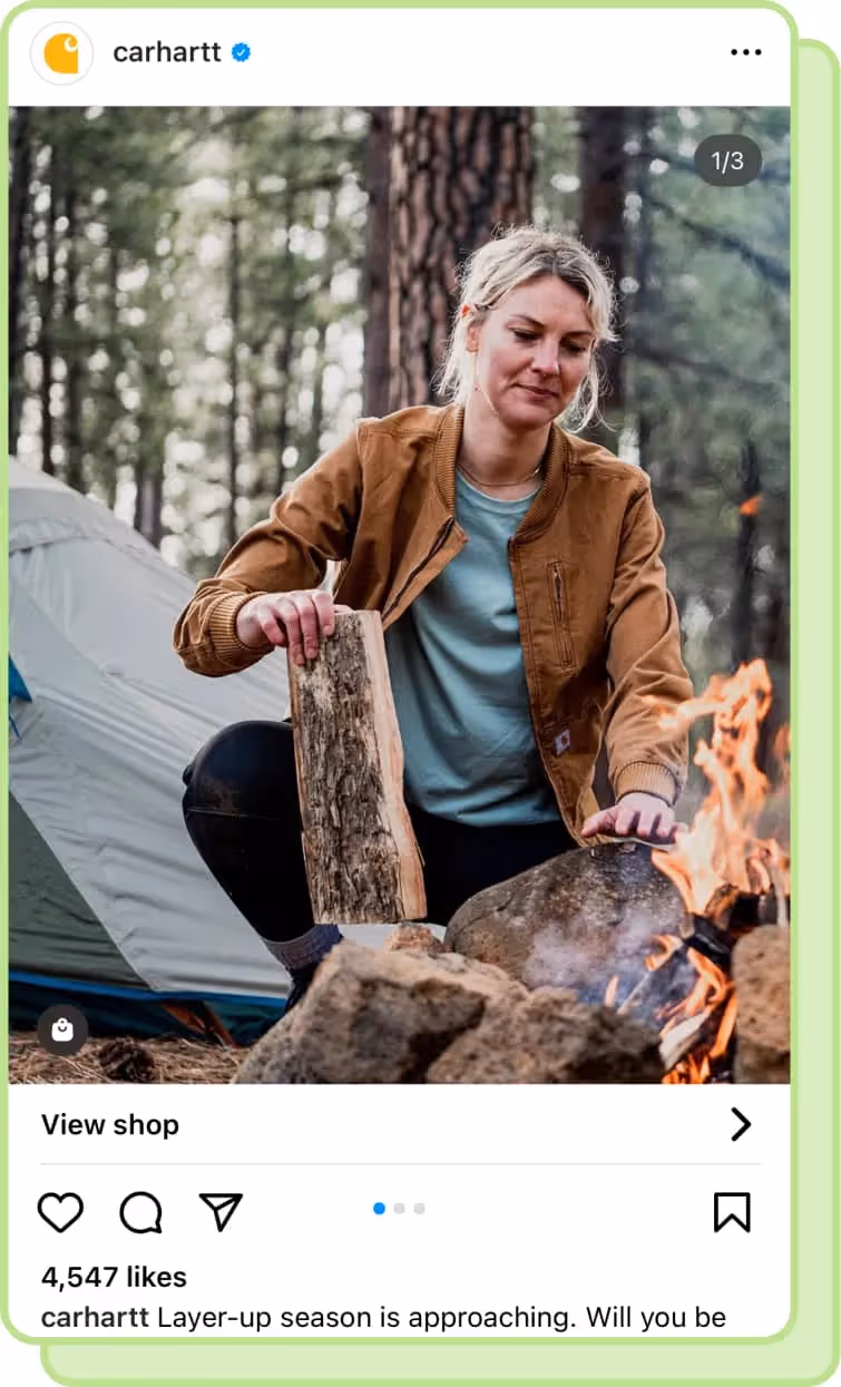 woman wearing carhartt and building fire while camping ig carousel screenshot