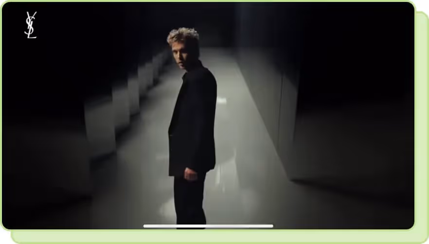 austin butler standing in dimly lit hallway