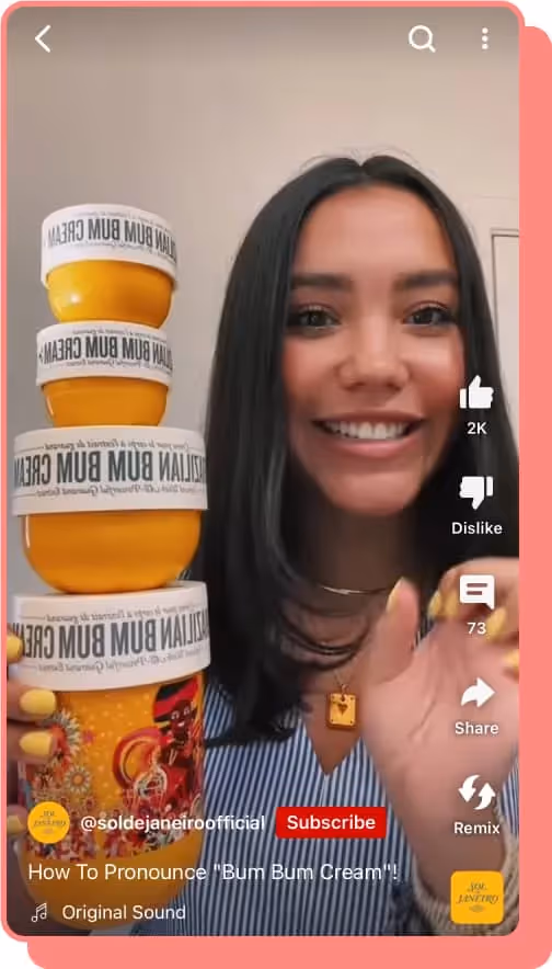 girl standing next to stack of sol de janerio bum bum cream